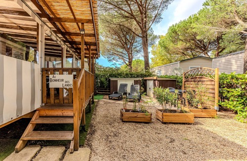 Gastes House | Mobile Home 'Au Bonheur Des Landes' with Shared Pool, Private Terrace and Air Conditioning