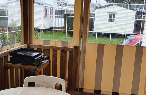 Les Mathes RV Rental | Mobile Home 'Au Coin Du Bonheur' with Shared Pool, Private Terrace and Air Conditioning