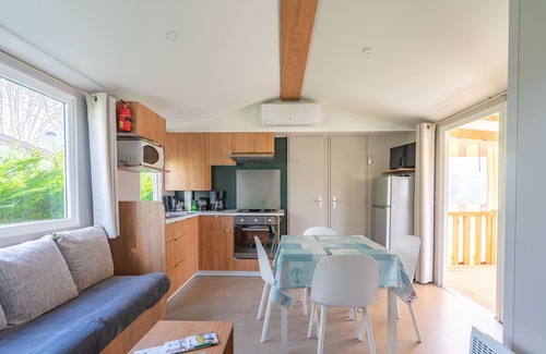 Les Mathes RV Rental | Mobile Home "Camping Les Charmettes" with Shared Terrace & Private Garden