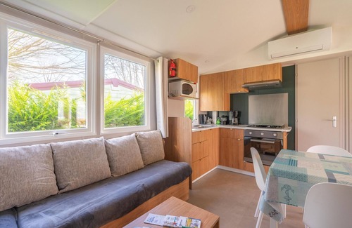 Les Mathes RV Rental | Mobile Home "Camping Les Charmettes" with Shared Terrace & Private Garden