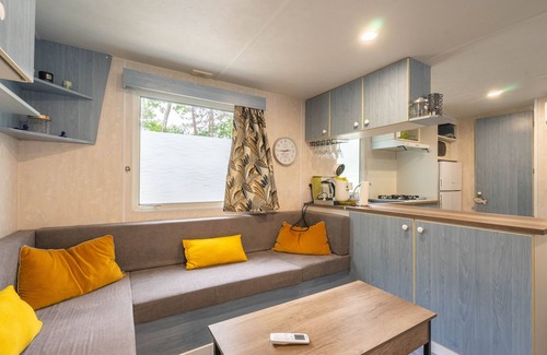 La Tremblade RV Rental | Mobile Home 'Mh75 La Tremblade' with Shared Pool, Terrace and Air Conditioning