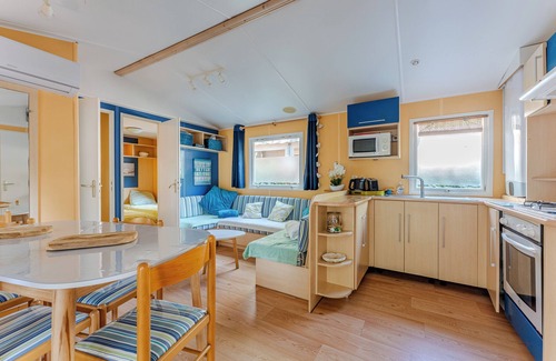 Gastes RV Rental | Mobile Home 'Mobil Home 304 Grand Confort' with Lake View, Private Terrace and Air Conditioning