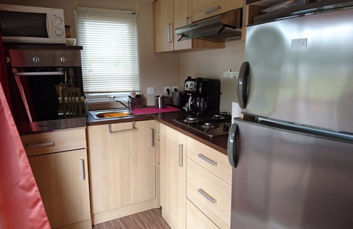 Dinard House | Mobile home on private domain open all year, heated swimming pool and tennis court