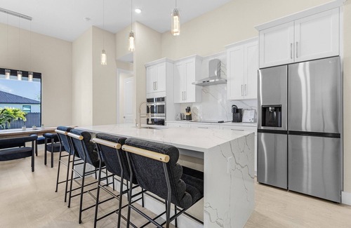 Burnt Store House | Modern 4-bed home with private heated pool, outdoor bar and grill in Cape Coral!