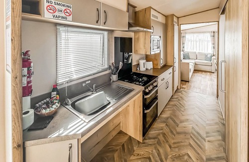 Bleadon House | Modern and contemporary 12ft-wide caravan with two twin.