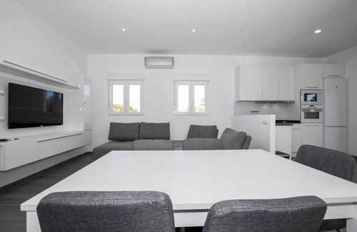 Cala Blanca Apartment | Modern Apartment "Marei 2" with Private Rooftop Terrace, Pool, Air Conditioning and Wi-Fi