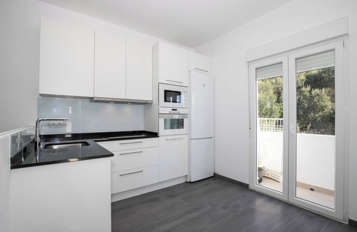 Cala Blanca Apartment | Modern Apartment "Marei 2" with Private Rooftop Terrace, Pool, Air Conditioning and Wi-Fi