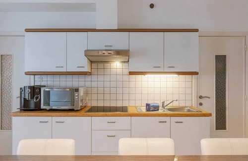 Stene Apartment | Modern Beachside Getaway | Balcony | Family