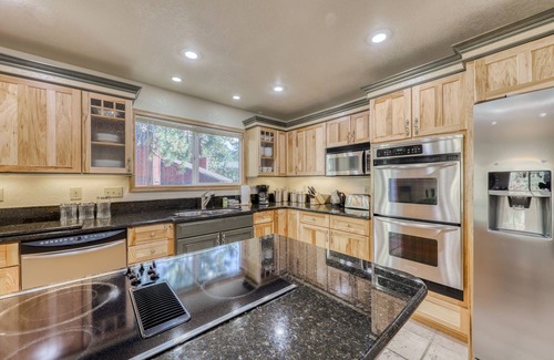 Zephyr Cove Cabin | Modern cabin with fireplace, spacious deck, & beautiful forest views, sleeps 6