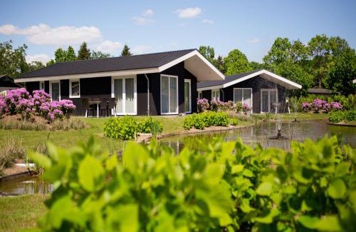 Municipality of Veldhoven Ski Chalet | Modern chalet on the water in the Brabant Kempen