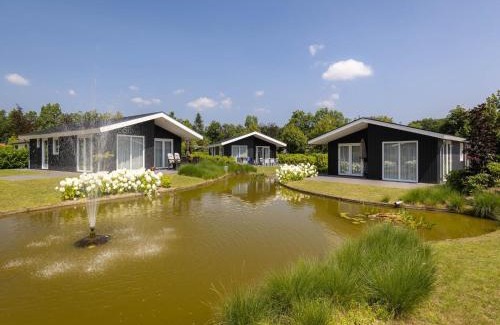 Municipality of Veldhoven Ski Chalet | Modern chalet on the water in the Brabant Kempen