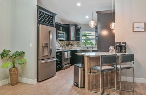 Diplomat House | Modern Coastal 3 Bedroom Villa with Salt Water Heated Pool & Office!