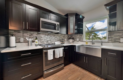 Diplomat House | Modern Coastal 3 Bedroom Villa with Salt Water Heated Pool & Office!