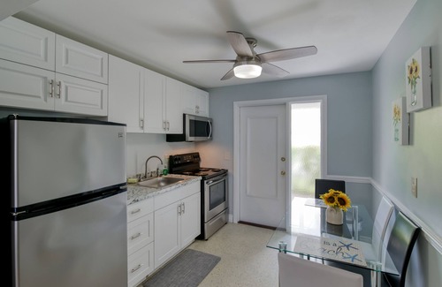 Singer Island Apartment | Modern condo in beach décor set amongst towering palms - 5-minute walk to beach