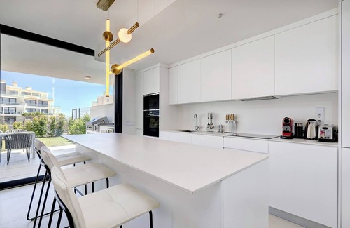 Fuengirola Apartment | Modern El Higueron West Apt with Private Garden & BBQ