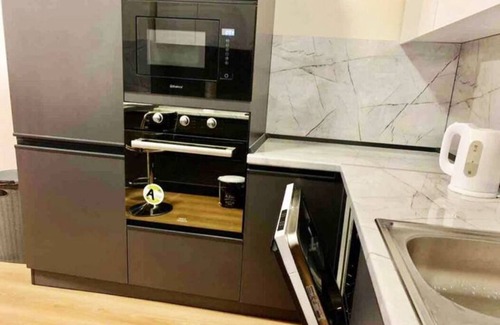 Tirana Condo | Modern family-sized condo with private veranda-5 min to the lake