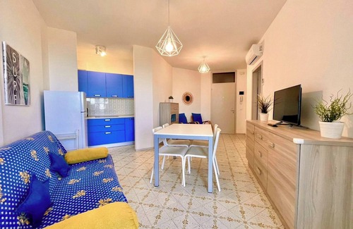 Porto Santa Margherita Apartment | Modern flat, 130m from the sea with shared pool