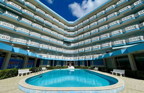 Porto Santa Margherita Apartment | Modern flat, 130m from the sea with shared pool