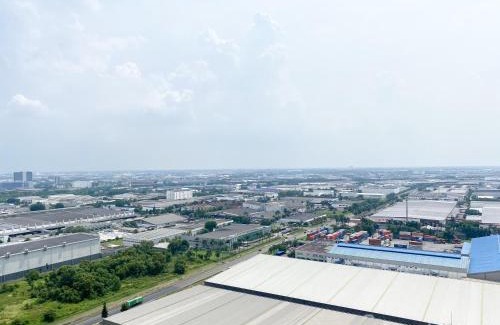 Cikarang Apartment | Modern Look and Warm Studio at Vasanta Innopark Apartment By Travelio