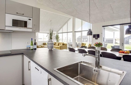 Marup House | Modern pool and activity house with jacuzzi, sauna, wifi and fireplace