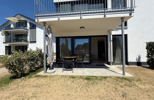 Unteruhldingen Apartment | Modern Suite Happiness with covered terrace near the lake and beach in Uhldinge