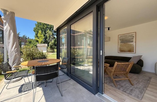Unteruhldingen Apartment | Modern Suite Happiness with covered terrace near the lake and beach in Uhldinge