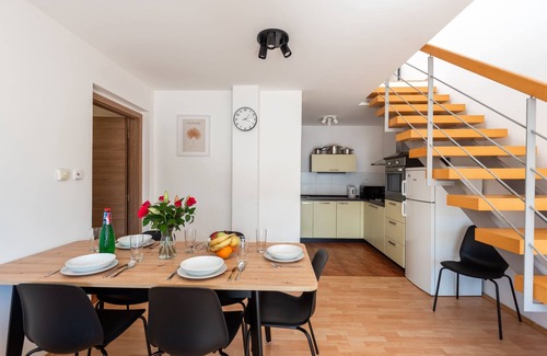 Smichov Apartment | Modern two-level apartment with balcony