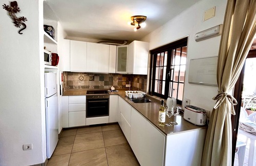 Playa Blanca Villa | Modern villa, shared pool, free WiFi, 100m to the sea, shops and restaurants.