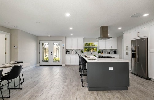 Cocoa Isles House | *Modern Waterfront Home* Sleeps 8-LARGE KITCHEN/LIVING Area-1 minute to beach