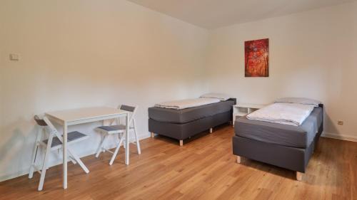 Ehrang-Quint Apartment | Monteurwohnungen in Trier - Parkplatz - Einzelbetten - Waschmaschine und Trockner