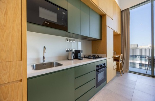 Al Satwa Apartment | Mood 22 - Deluxe Loft Studio: Chic & Cozy Retreat
