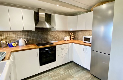Harlyn Cottage | Morwennol - a two storey property that sleeps 6 guests in 3 bedrooms