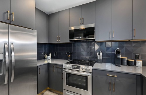Rolling Mill Hill Condo | Muse | City-view condo with central AC, balcony & onsite gym