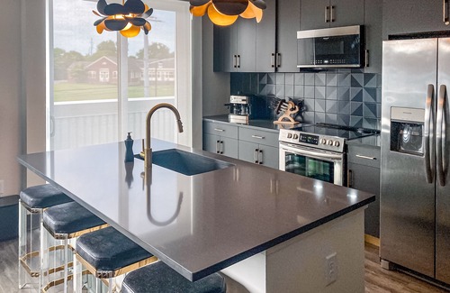 Rolling Mill Hill Apartment | Muse Contemporary second-floor condo with high-speed WiFi, central AC & balcony