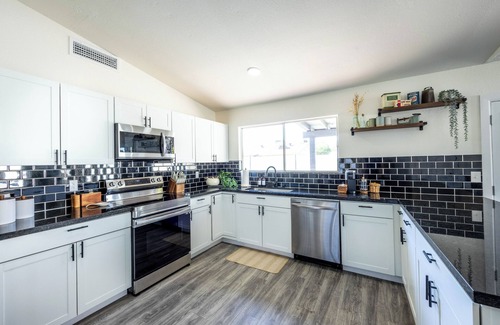 Chandler House | MUST SEE! Heated Jacuzzi w/Pool! Newly Remodeled! Mid-Century Modern Decor!