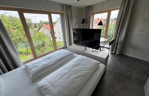 Meckenbeuren Apartment | My Flats Studio Apartements - klimatisiert - nahe Ravensburger Spiele