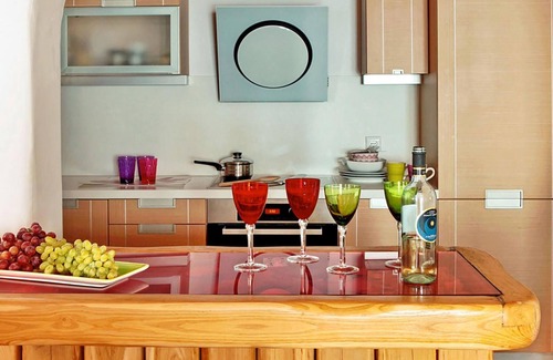 Alyki Villa | My Rental Homes - Queen Villa with pool area furnished with sunbeds and sea view
