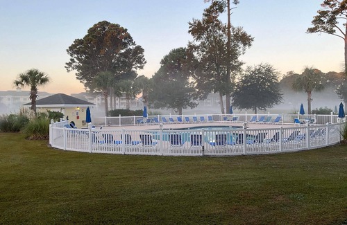Central Myrtle Beach Condo | Myrtlewood 2-bedroom condo accepting pets. Pool in the backyard
