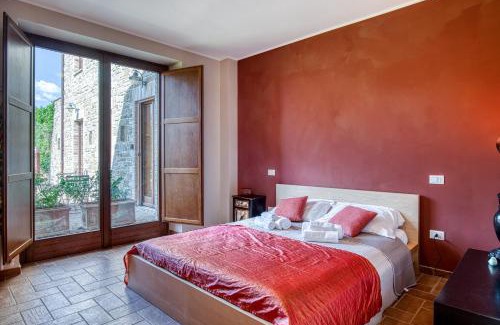 Fratticiola Selvatica Apartment | Nature's Haven Apartments in Renovated Farmhouse with Pool