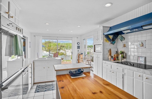 Harwich Port House | Nautical retreat with water views, inground heated pool, and private beach access