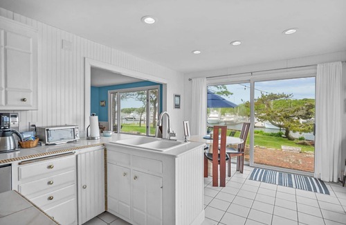 Harwich Port House | Nautical retreat with water views, inground heated pool, and private beach access