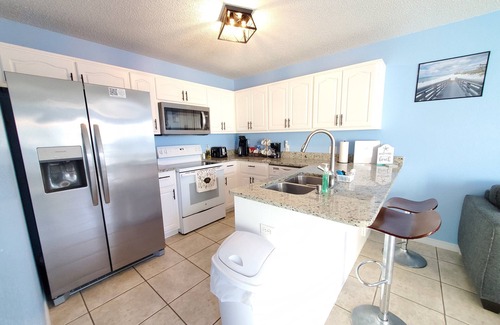 Navarre Beach Condo | Navarre Beach Landing - Beach Gear Included - Walk to Beach - Sunset Views