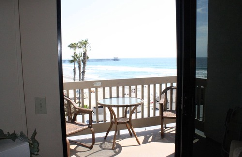 Townsite Condo | NCV D306 2BR 2BA 2-story Penthouse with breathtaking ocean, sand, & pier views.