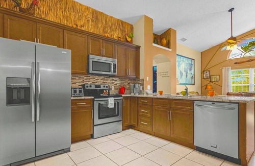 West Kissimmee Villa | Near Disney Parks 10 min. Themed rooms, game room, Private Pool with Screen deck