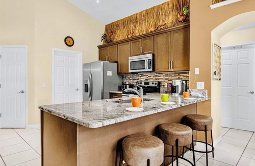 West Kissimmee Villa | Near Disney Parks 10 min. Themed rooms, game room, Private Pool with Screen deck