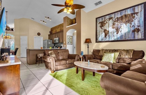 West Kissimmee Villa | Near Disney Parks 10 min. Themed rooms, game room, Private Pool with Screen deck