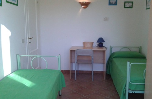 Porto San Paolo House | Near the sea - three-room apartment with large garden in the BORGO of Porto San Paolo