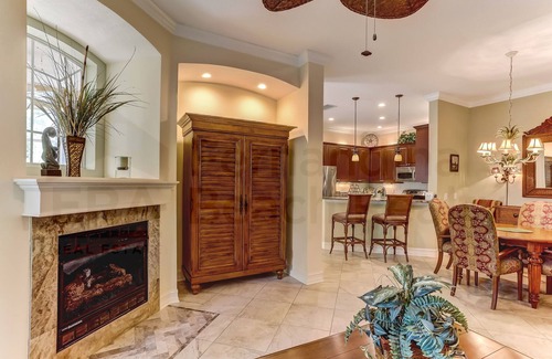 American Beach Condo | Nestled in a sancutary of beautiful trees in gated Villas at Summer Beach. Ground Floor unit.