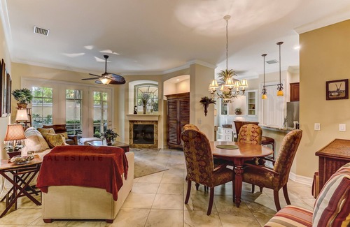 American Beach Condo | Nestled in a sancutary of beautiful trees in gated Villas at Summer Beach. Ground Floor unit.
