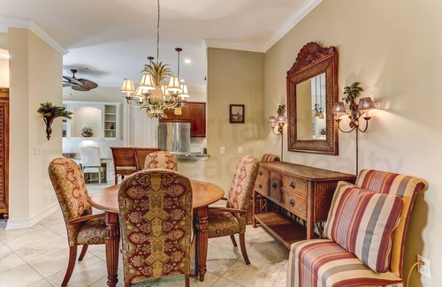 American Beach Condo | Nestled in a sancutary of beautiful trees in gated Villas at Summer Beach. Ground Floor unit.